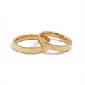 Par de Anillos Dharma 10gr. de Oro Amarillo 18K con diamante VVS1